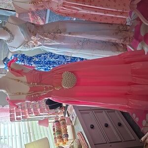 Elegant Pink Maxi Dress with Bow Straps And Corset Bodice And Taffeta Skirting.